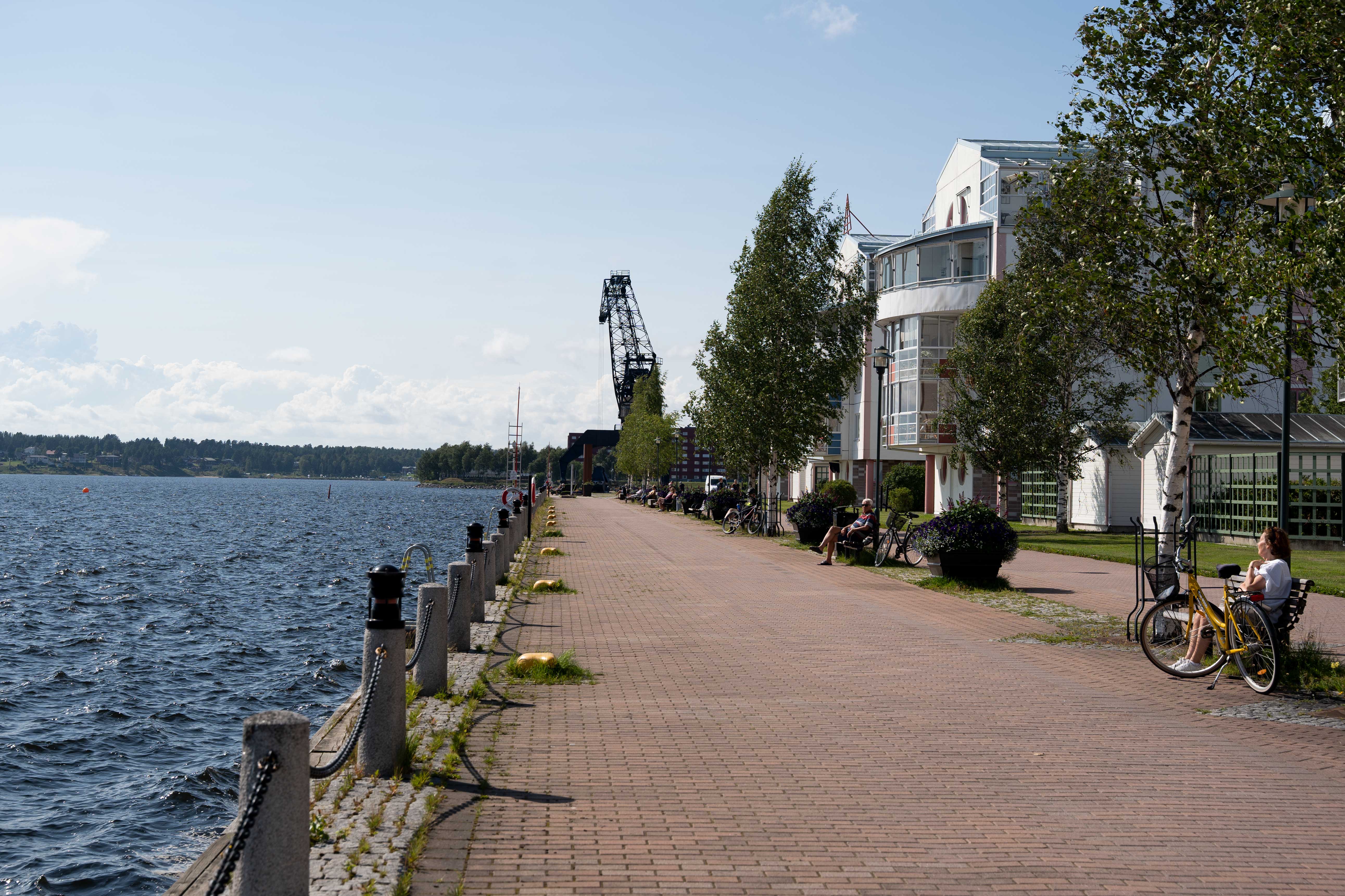 view over a path towards Södra hamnplan overlooking the water.